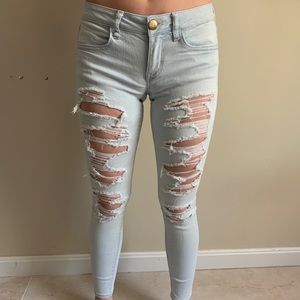 AMERICAN EAGLE LIGHT RIPPED LOW RISE JEGGINGS